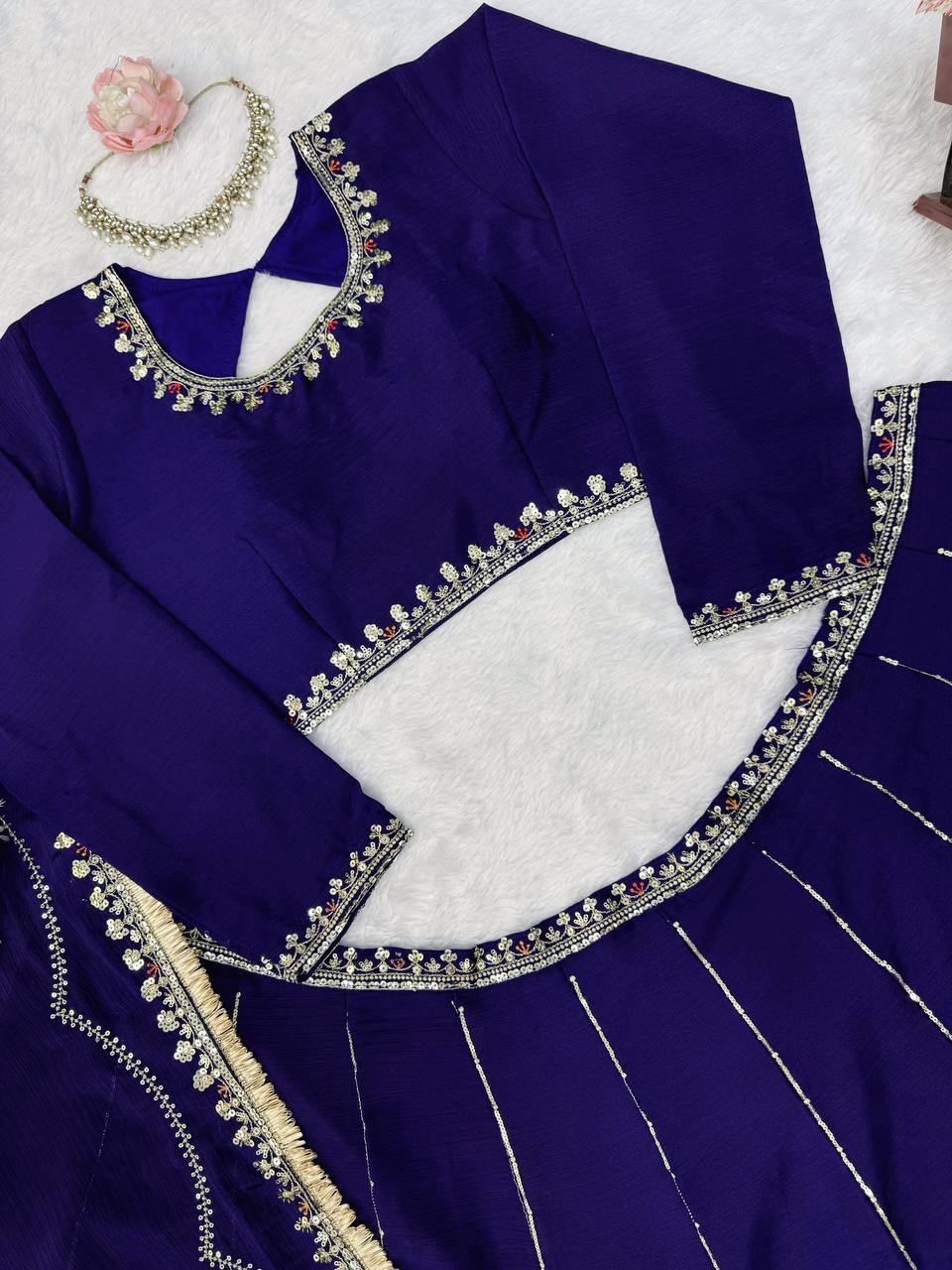 Radiant Rani Pink Silk Lehenga Choli Adorned with Opulent Heritage Floral Motifs and Intricate Zari Borders